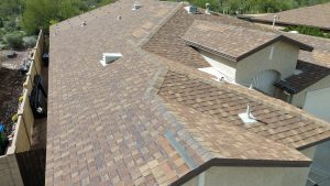 Professional shingle roofing system installed on a Tucson home, offering long-term durability and climate resilience.